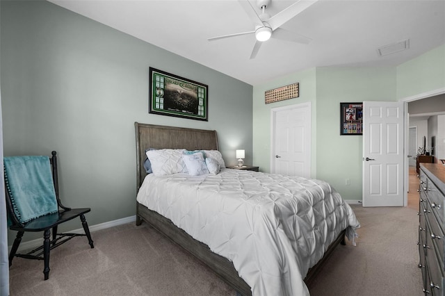 carpeted bedroom with ceiling fan