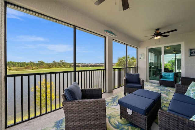 sunroom / solarium with ceiling fan