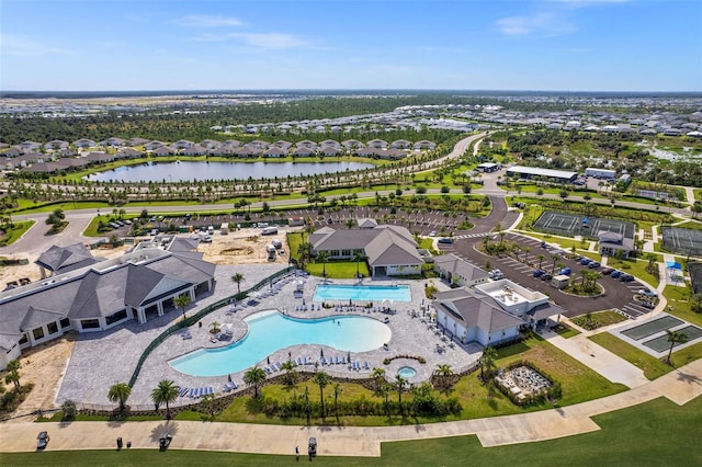 bird's eye view with a water view