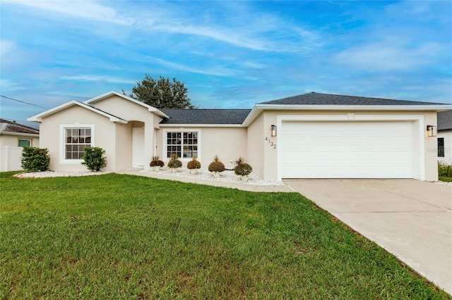 single story home featuring a front yard and a garage