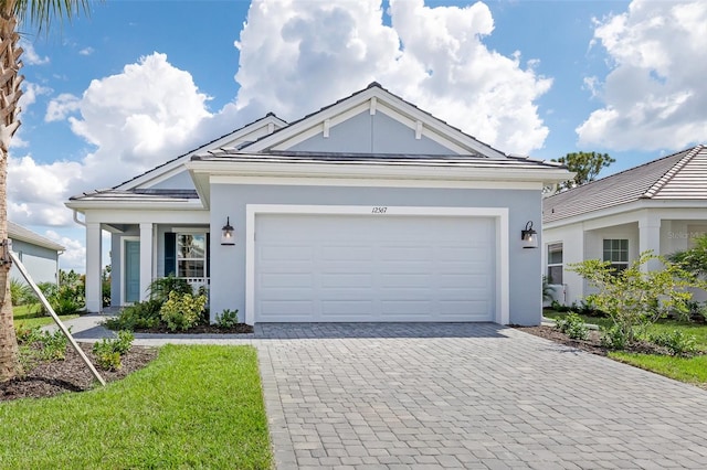 view of front of property featuring a garage