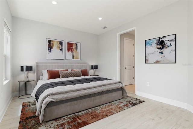 bedroom featuring light hardwood / wood-style flooring