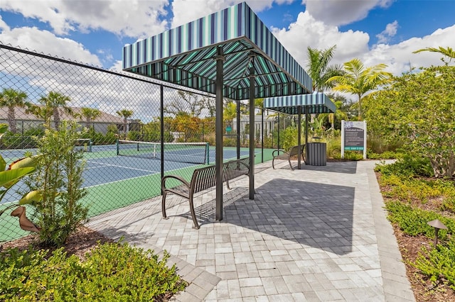 exterior space with tennis court