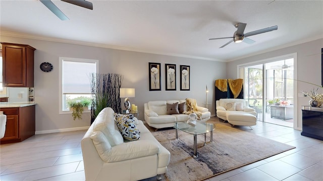 tiled living room with ceiling fan and ornamental molding