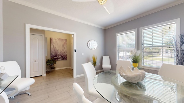 dining room featuring ornamental molding and ceiling fan