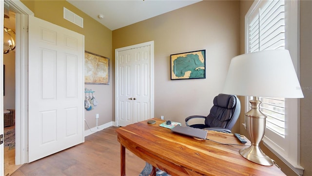 office area featuring hardwood / wood-style floors