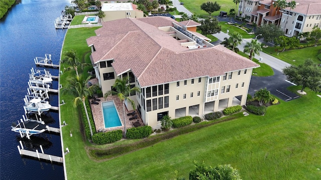 drone / aerial view featuring a water view