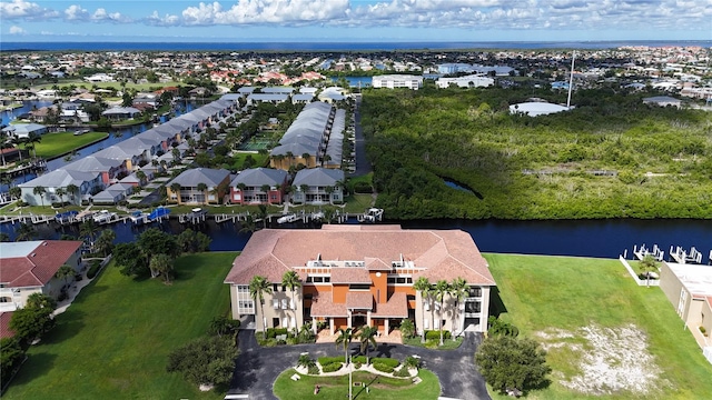 drone / aerial view with a water view