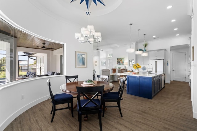 dining area featuring dark hardwood / wood-style flooring and ceiling fan