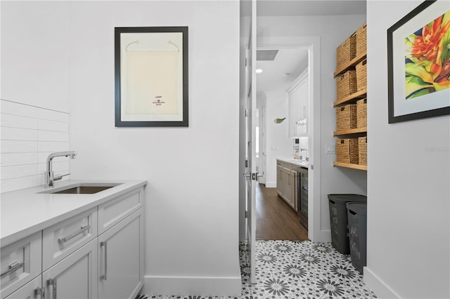 bathroom with wood-type flooring and vanity