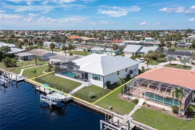 bird's eye view with a water view