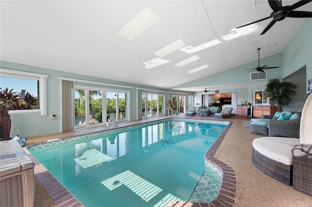 view of pool featuring ceiling fan