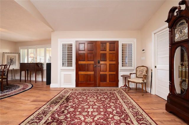 entrance foyer featuring wood-type flooring