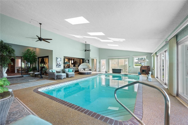 view of pool featuring ceiling fan