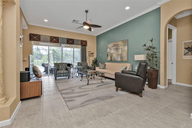 living room featuring light tile patterned floors, ceiling fan, and ornamental molding