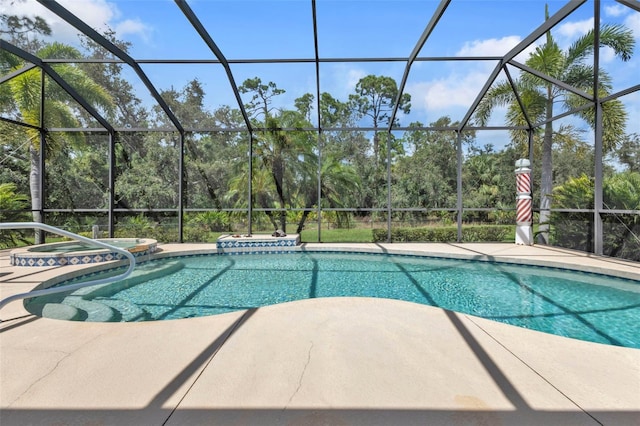 view of swimming pool featuring glass enclosure