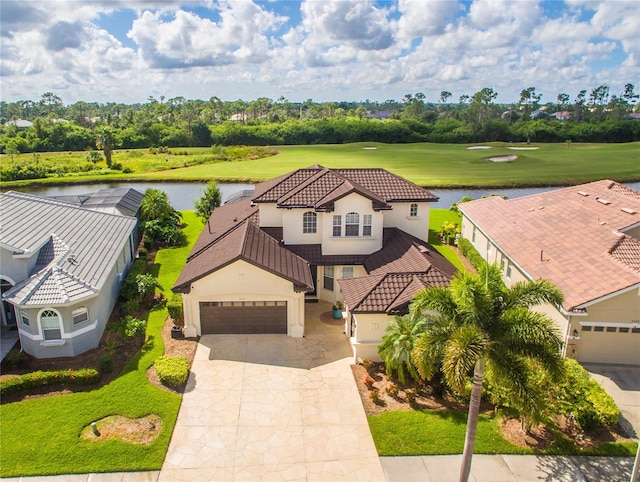 drone / aerial view with a water view