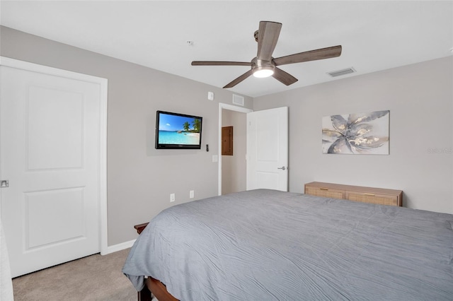 carpeted bedroom with ceiling fan