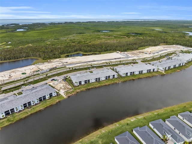 drone / aerial view featuring a water view