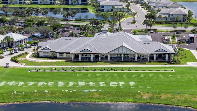 aerial view featuring a water view and a residential view