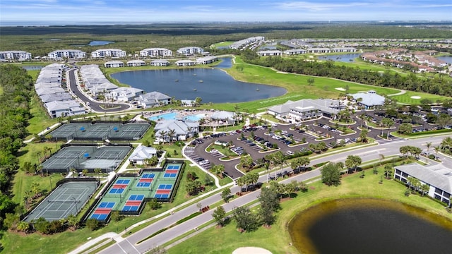 aerial view featuring view of golf course and a water view