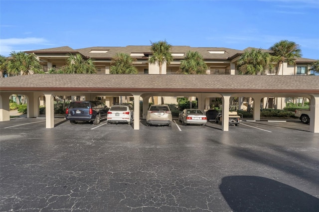 view of car parking featuring a carport