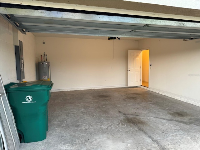 garage with a garage door opener, water heater, and electric panel