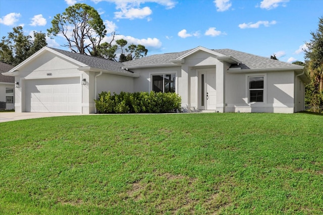 ranch-style home with a garage and a front lawn