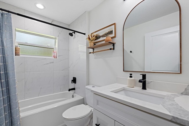 full bathroom with vanity, toilet, and shower / bath combo with shower curtain