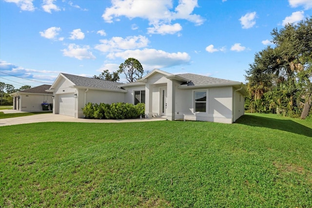 view of front of home featuring a garage and a front yard