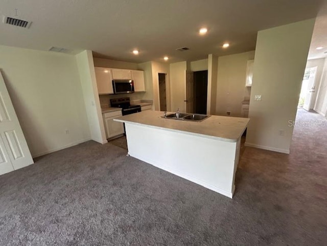 kitchen with white cabinets, an island with sink, sink, dark colored carpet, and black range with electric cooktop