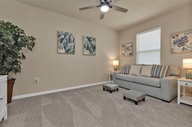 living room with light colored carpet and ceiling fan