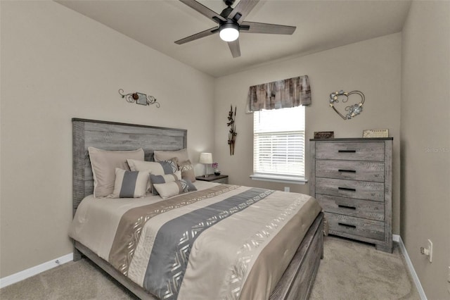 bedroom with light carpet and ceiling fan