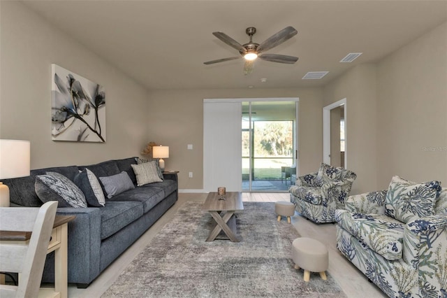 living room with ceiling fan