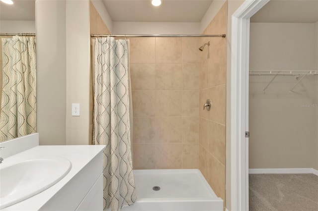 bathroom featuring vanity and a shower with curtain