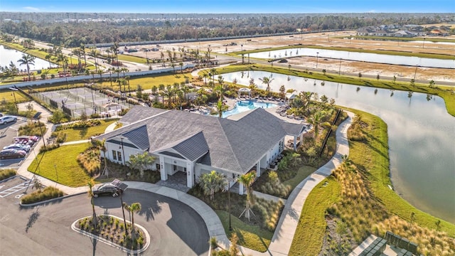 drone / aerial view with a water view