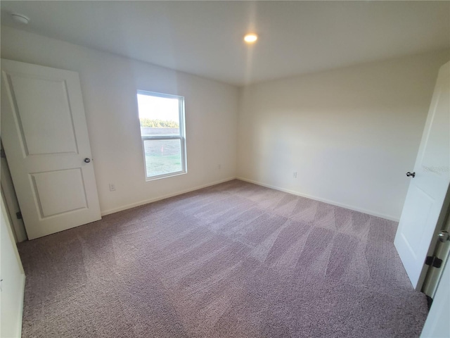 unfurnished bedroom with carpet