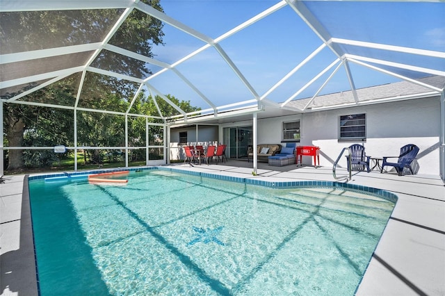 view of pool featuring a lanai and a patio area