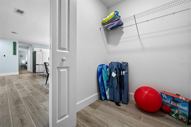 interior space with light hardwood / wood-style flooring