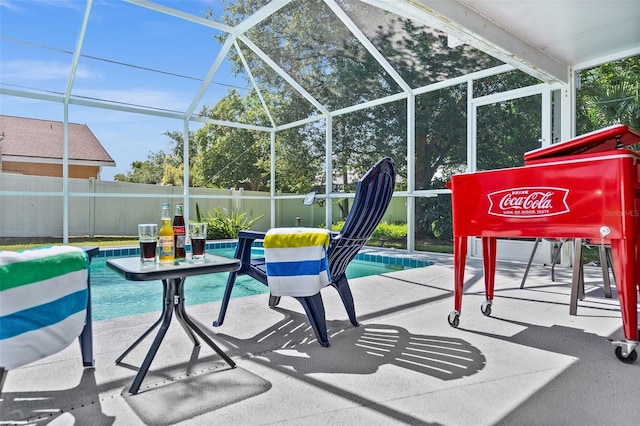 exterior space with a fenced in pool and a lanai