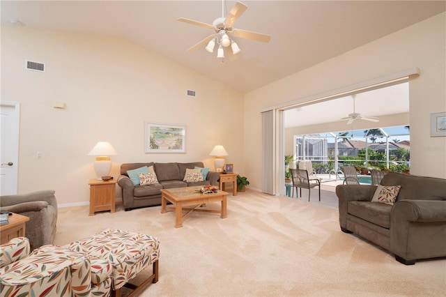 living room with light carpet, high vaulted ceiling, and ceiling fan