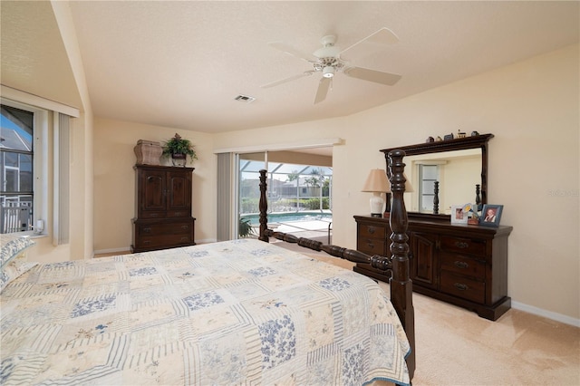 bedroom with access to exterior, light colored carpet, and ceiling fan