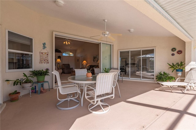 view of patio featuring ceiling fan