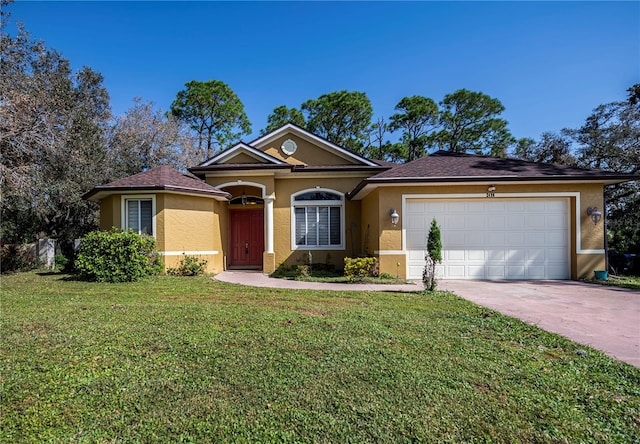 ranch-style home featuring a front lawn and a garage