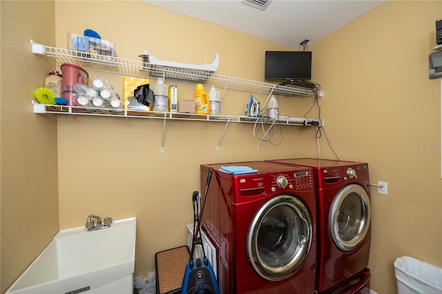 laundry room featuring separate washer and dryer