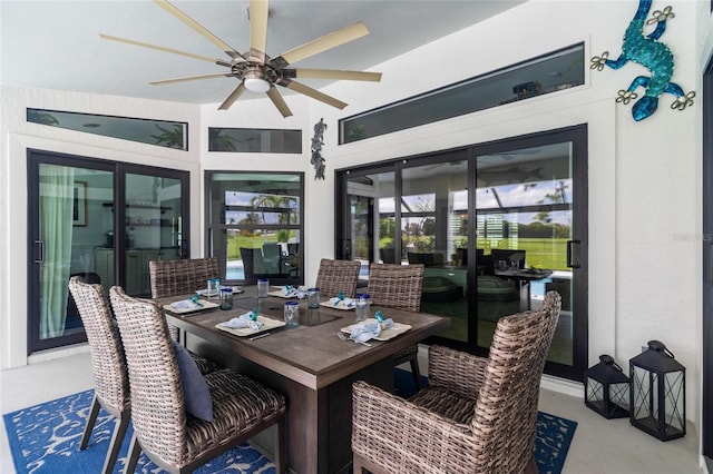 sunroom / solarium with ceiling fan