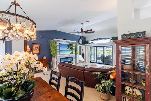 living room featuring light tile patterned flooring and ceiling fan