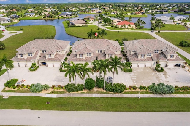 birds eye view of property featuring a water view