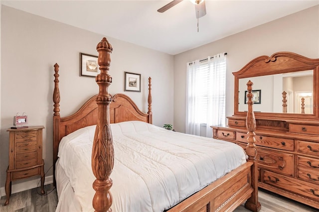 bedroom featuring light hardwood / wood-style flooring and ceiling fan