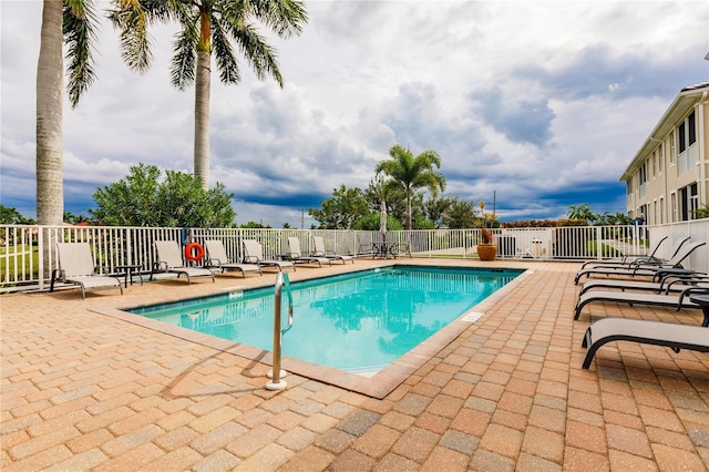 view of swimming pool featuring a patio